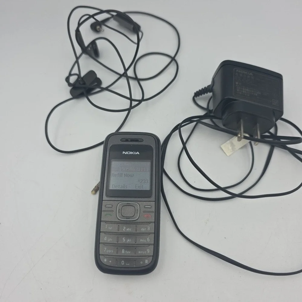 Nokia Cell Phone Model 1208 T-Mobile With Charger And Ear Buds